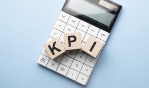 kpi key performance indicator company goal concept cube blocks building word acronym calculator